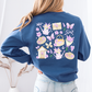 Lavender-Themed Indigo Blue Sweatshirt with Books, Teapot & Bread Basket | Cottagecore Cozy